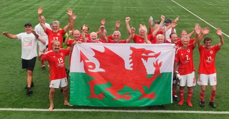 Micky (far right) celebrates victory in the Over 70s World Cup